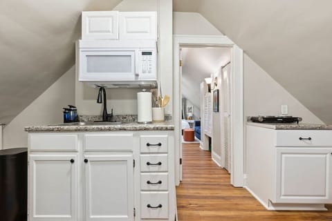 Bright kitchen with modern appliances, ready for your delicious creations.