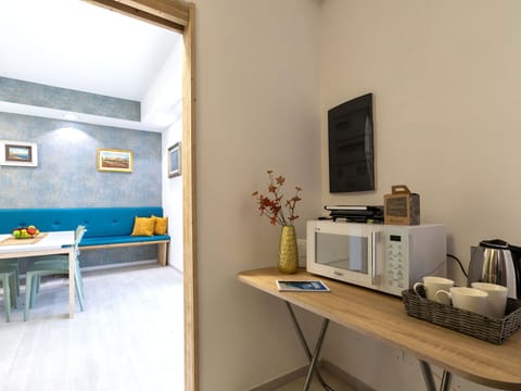 Furniture, Interior Design, Wall, Flooring, Floor, Wood, Room, Ceiling, Lighting, Apartment