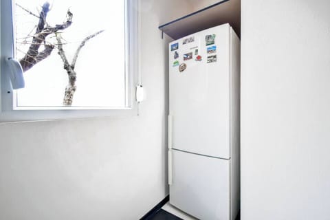 Keep your groceries fresh with a spacious fridge, ensuring you have everything you need for a home-cooked meal.