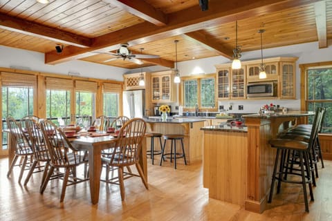 Fully equipped kitchen with adjacent dining area — perfect for family cooking and hosting.