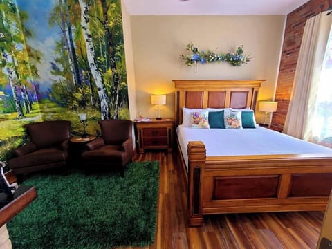 Enjoy relaxing in a King bed or lounging by the fire