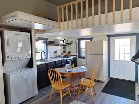 Loft space is accessible via pull down ladder.