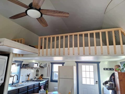 Loft space is accessible via pull down ladder.
