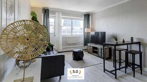 A bright and inviting living area with stylish decor, large windows, and a contemporary aesthetic.