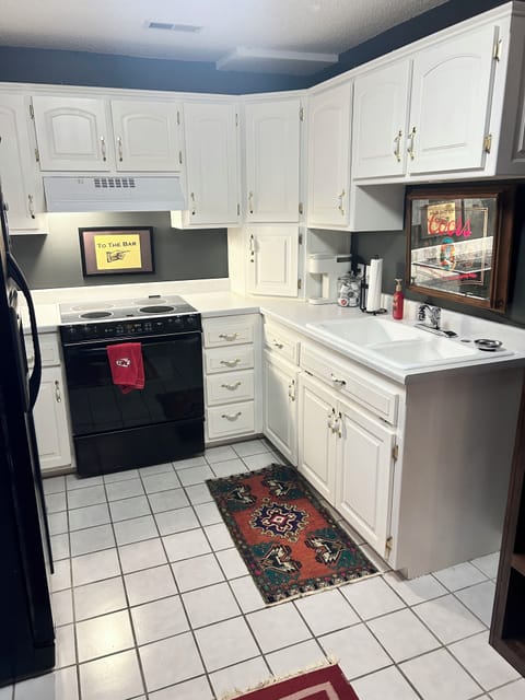 Spacious and clean kitchen with all the amenities, including a Keurig