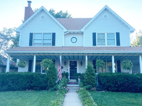 The front of the entire house. Private guest entrance on the south side (left).