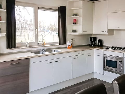 Countertop, Kitchen, Cabinetry, Kitchen Appliance, Kitchen Sink, Sink, Wood, Plumbing Fixture, Interior Design, Flooring