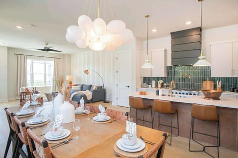 Open living, dining, and kitchen area