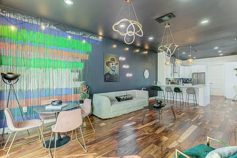 Bright and exciting living area with Smart TV, and ample seating 