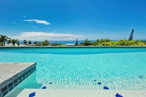 Swimming pool with expansive coastline views