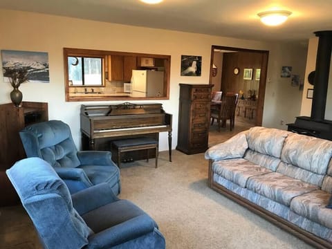 View of living room with piano