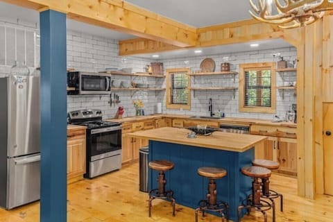 Full kitchen will all the dishes, cookware, and appliances that you could need.