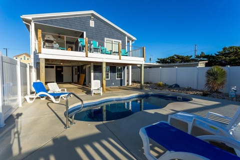 This charming retreat combines classic coastal vibes with modern comforts to create an unforgettable vacation experience.