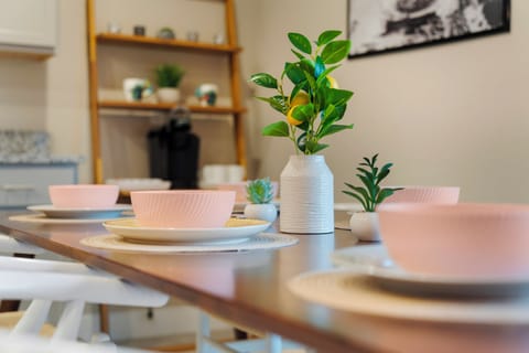 Plates, glasses, and decor set for a welcoming touch.