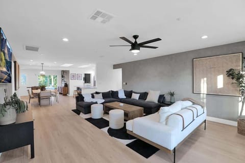 Bright, open-concept living area with cozy seating and modern design