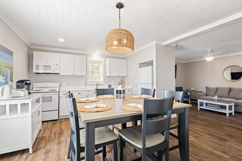 Open concept dining room/kitchen/living room makes the space feel spacious and comfortable. Very well-stocked kitchen with a coffee bar.