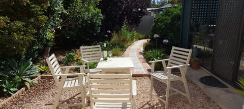 Sunny courtyard with seating area