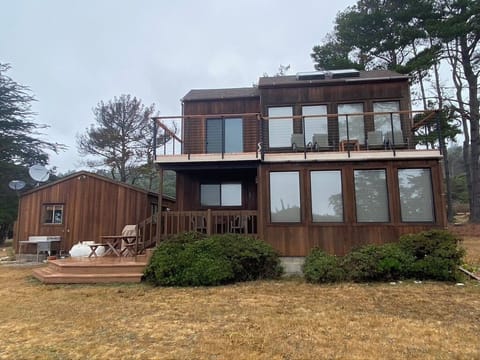 These front windows face west with an ocean view from the top patio, and whales