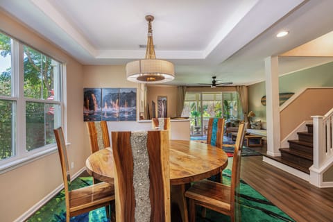 The dining area comfortably seats six, perfect for family meals or entertaining guests.