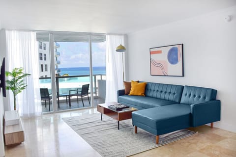 Relax indoors with ocean views framed by floor-to-ceiling glass.