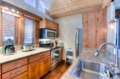 Kitchen w/ toaster oven, drip coffee pot, blender, slow cooker and more