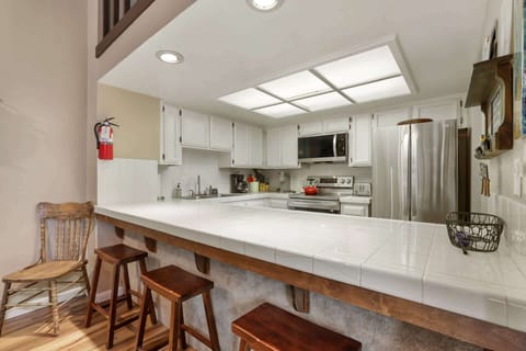 Kitchen bar counter with seating for 3