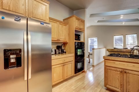 Kitchen with drip coffee maker, toaster oven, blender, waffle maker, slow cooker, and more!