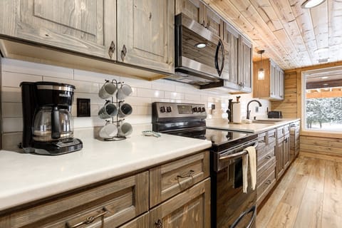 Wake up and savor the aroma of freshly brewed coffee in this fully updated, bright, and spacious kitchen