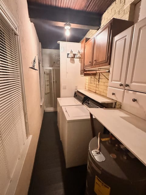 Washer dryer, leading to first floor bathroom