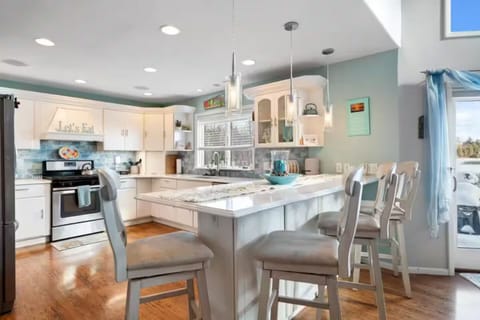 Spacious kitchen with bar area