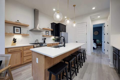 Our kitchen features a fridge, oven/stove, a dishwasher, and a GE Appliances microwave for quick reheats. Plus, enjoy breakfast with our 4-slot toaster, Oster blender, and Cuisinart electric handheld whisk—all designed to make your stay convenient