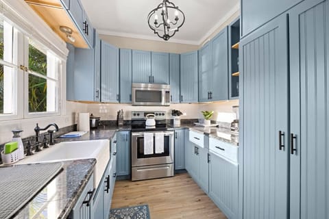 Bright and fully equipped kitchen—perfect for cooking up your favorite dishes in a cozy atmosphere.