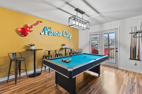Pool Table with additional seating and bar cart!