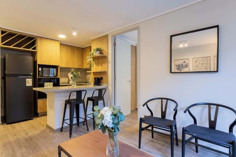 Cozy kitchen with modern amenities and stylish decor, perfect for enjoying a homemade meal.
