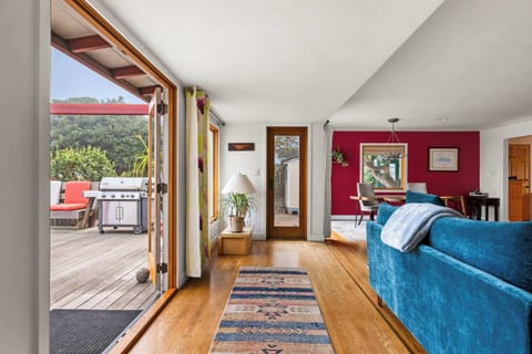 Living room doors open to the outdoor space