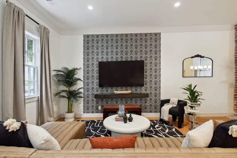 Unit A | Living Room | Comfortable Seating + TV | First Floor