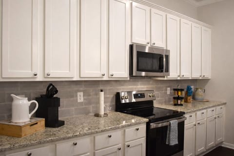 Clean, functional layout with essential cookware