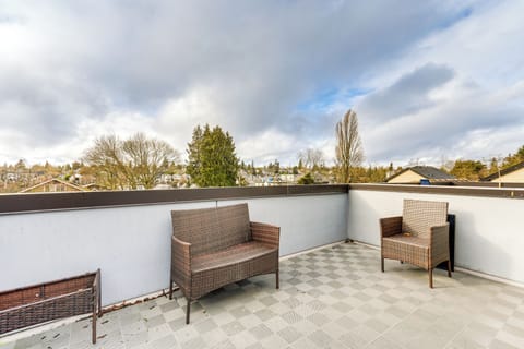Townhome Exterior | Rooftop Patio w/ Seating