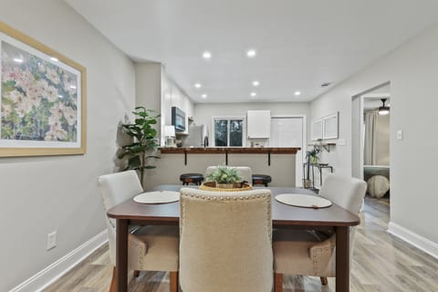 This dining area, seating 4, is perfectly positioned with an open flow to the kitchen and living room—ideal for shared meals and great conversations.