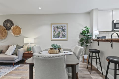 This dining area, seating 4, is perfectly positioned with an open flow to the kitchen and living room—ideal for shared meals and great conversations.