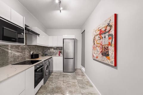 Cook in style — a sleek, fully equipped kitchen ready for your culinary creations