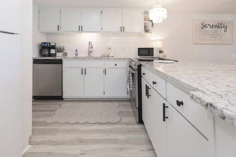 Whip up family favorites in this airy, fully equipped kitchen—perfect for post-beach meals and easy entertaining