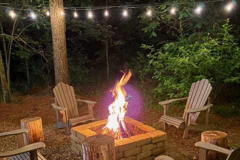 Gather around the firepit for cozy nights under the string lights