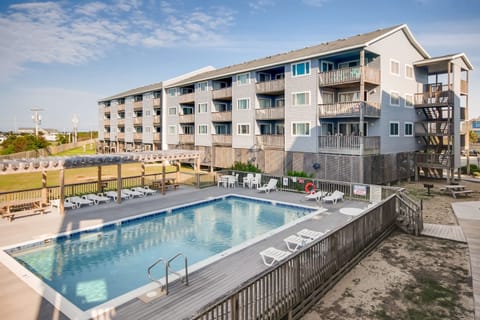 The stunning exterior of Rodanthe Respite, complete with a large pool for ultimate relaxation.
