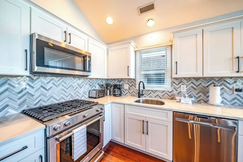 Sleek kitchen with modern amenities
