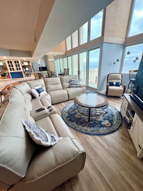 Large leather sectional and two story living space