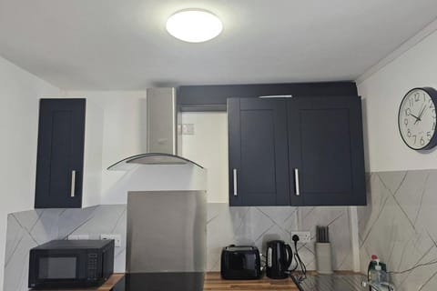 Fully equipped with modern appliances, including a stove, oven, fridge & freezer, and microwave. Spoons, plates, pots, and utensils are provided, so you can easily prepare your meals. Everything you need for a comfortable, home-like experience. You can also enjoy the convenience of a dining area for meals.