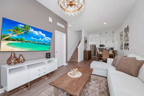 Relax and unwind in the spacious living room, perfect for movie nights or lounging.