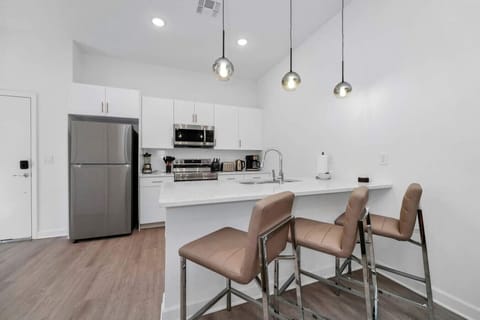 Whip up your favorite meals in the fully stocked kitchen, equipped with all the essentials.