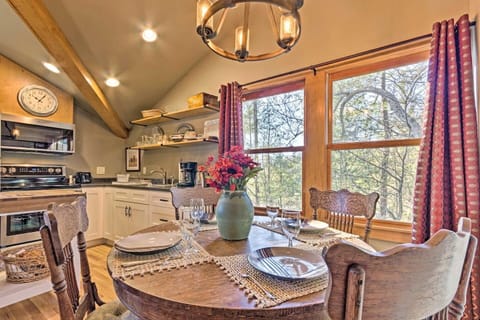 Fully equipped kitchen with full sized refrigerator.
